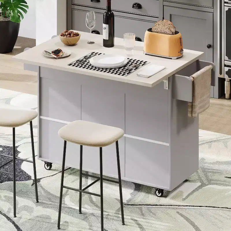 Isola cucina su ruote con spazio porta sacchetto della spazzatura, piano ribaltabile e ripiano regolabile
